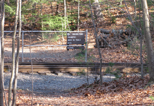 railroad tracks and sign for Walden property