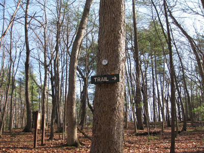 a trail sign in Adams Woods